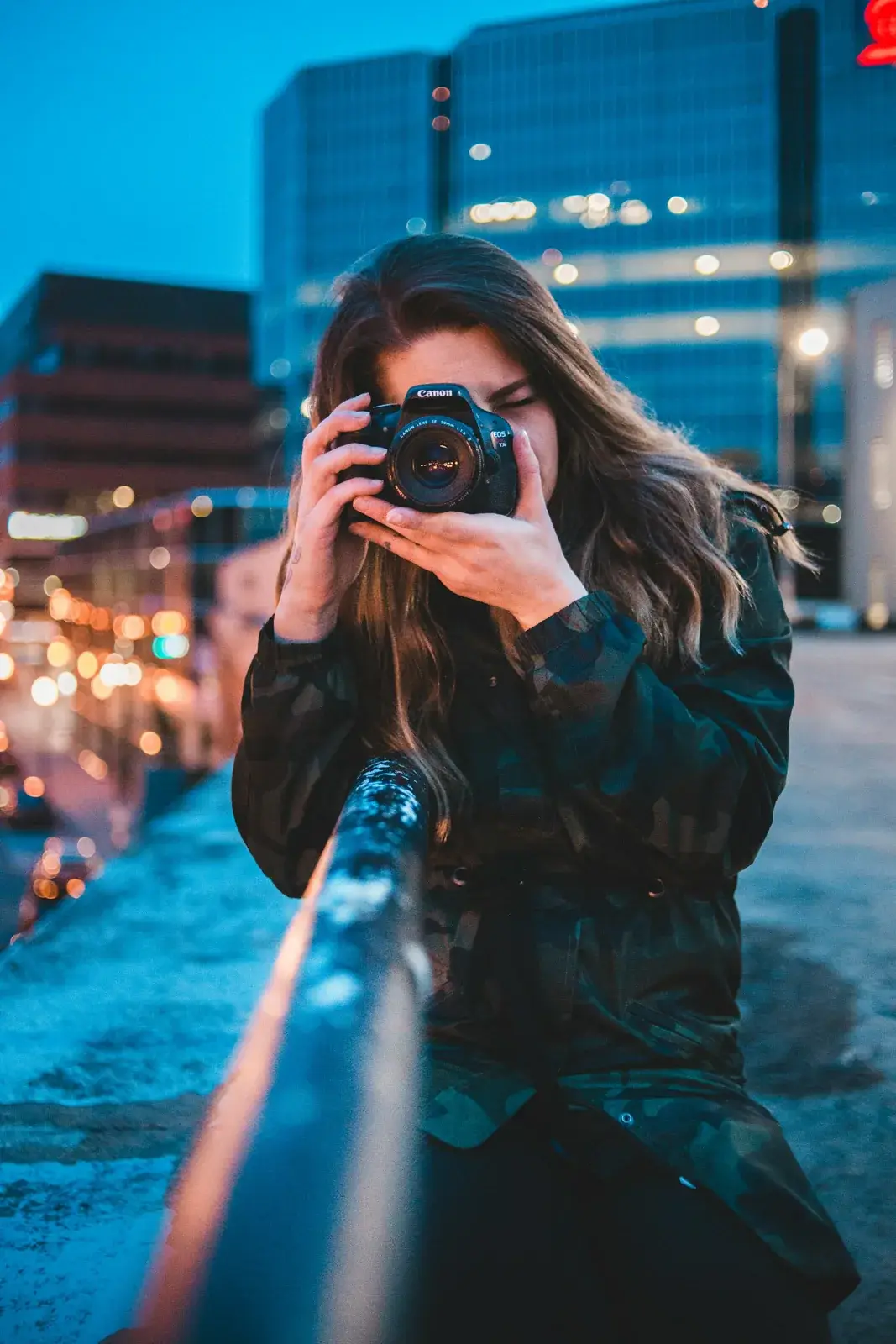 Creator filming with a camera